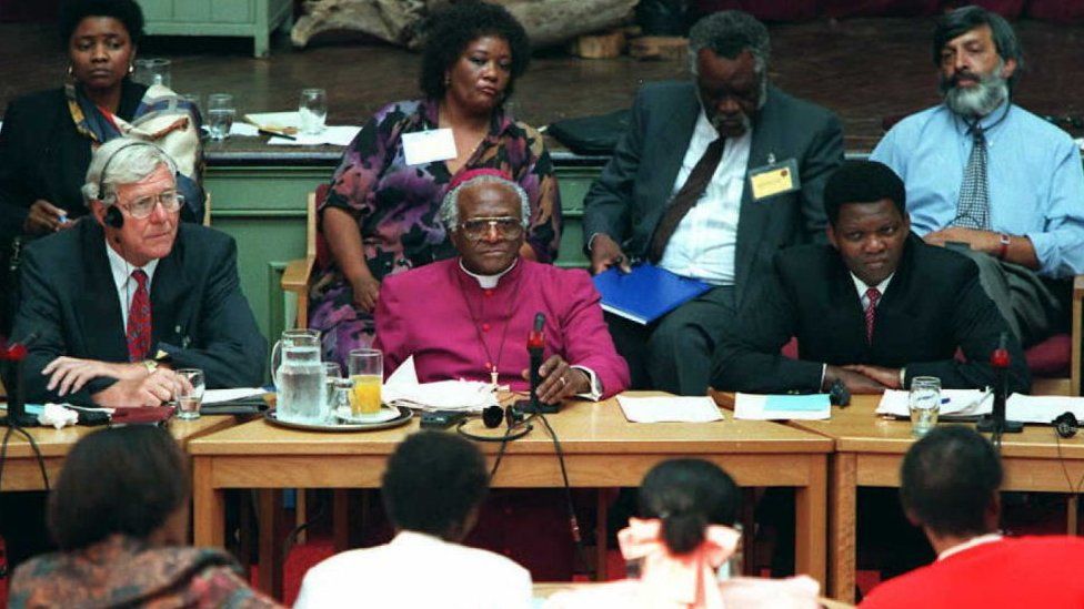 Archbishop Desmond Tutu overseeing the Truth and Reconciliation Commission.