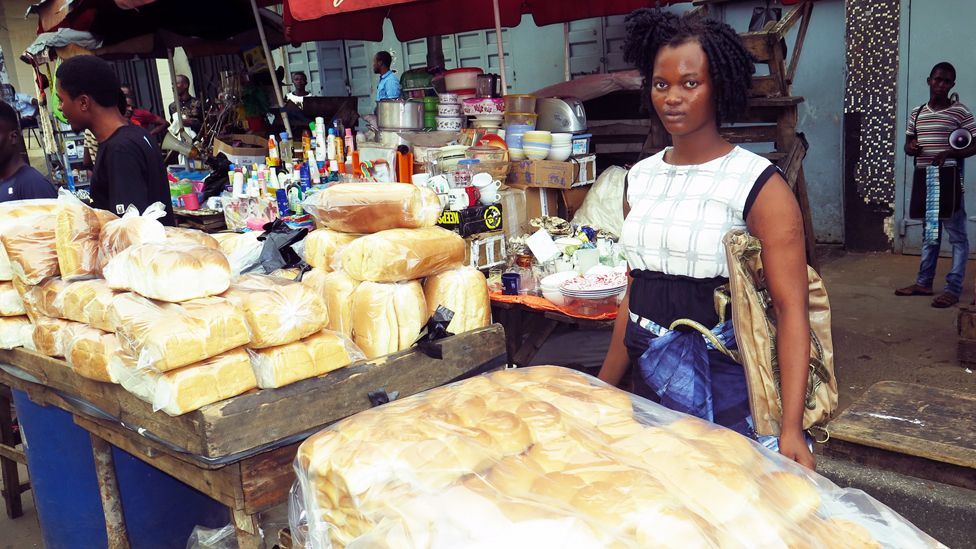 Comfort Conteh selling bread in Freetown. Photo: Umaru Fofana, BBC Africa