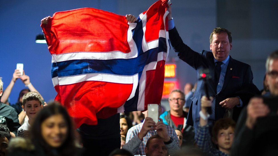 Supporters of Magnus Carlsen, celebrate his victory at the World Chess Championship on November 30, 2016 in New York