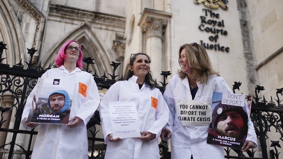 Just Stop Oil protesters outside the Royal Courts of Justice in London, where activists Morgan Trowland, 40, and Marcus Decker, 34, are appealing their jail sentences