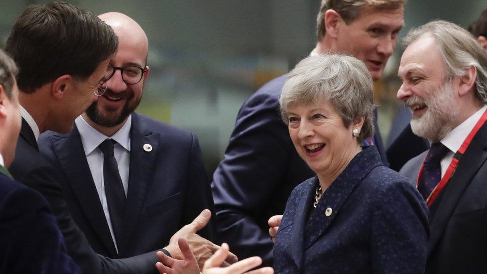 Luxembourg"s Prime Minister Xavier Bettel, Dutch Prime Minister Mark Rutte, Belgium"s Prime Minister Charles Michel, Britain's Prime Minister Theresa May and President of the European Commission Jean-Claude Juncker share a smile and a joke at last week's European Council summit