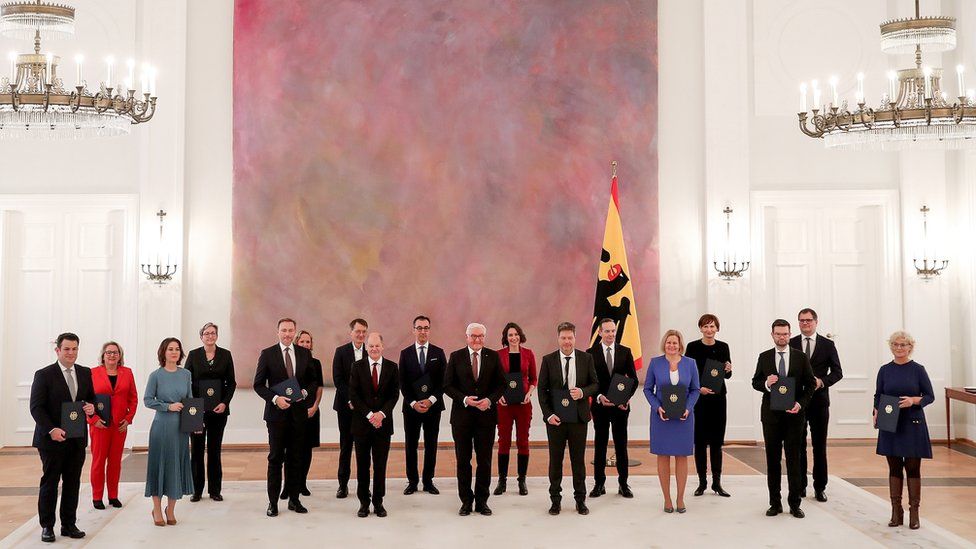German President Frank-Walter Steinmeier (C) and newly appointed Ministers pose for the media during the appointment of the Federal Ministers at the Bellevue Palace in Berlin, Germany, 08 December 2021