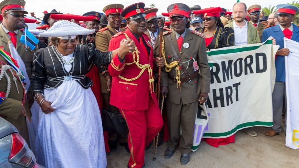 Paramount Chief Adv. Vekuii Rukoro (M) dances after inaugurating a new street named "Dr Kuaima Riruako" during high-ranked chiefs and other members of the Herero and Nama communities take part on the Reparation Walk 2019, organized by the Ovaherero Genocide Foundation (OGF) in Swakopmund, Namibia, on March 30, 2019