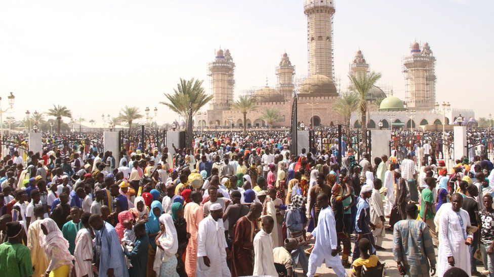 Pilgrims outside the grand mosque