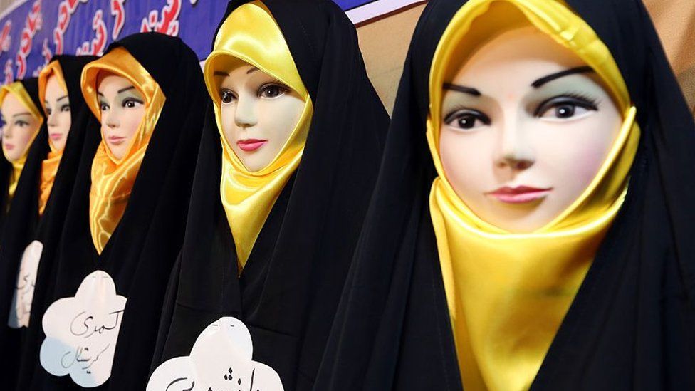 Headscarves are displayed on mannequins at the Islamic fashion exhibit in central Tehran on December 18, 2014.