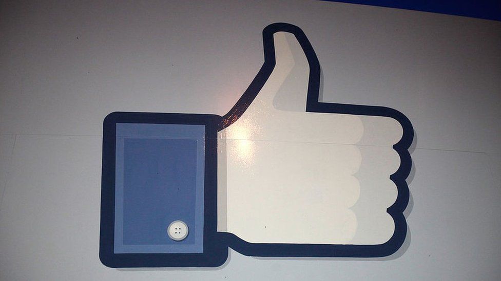 A 'like' sign stands at the entrance of Facebook headquarters 18 May 2012 in Menlo Park, California