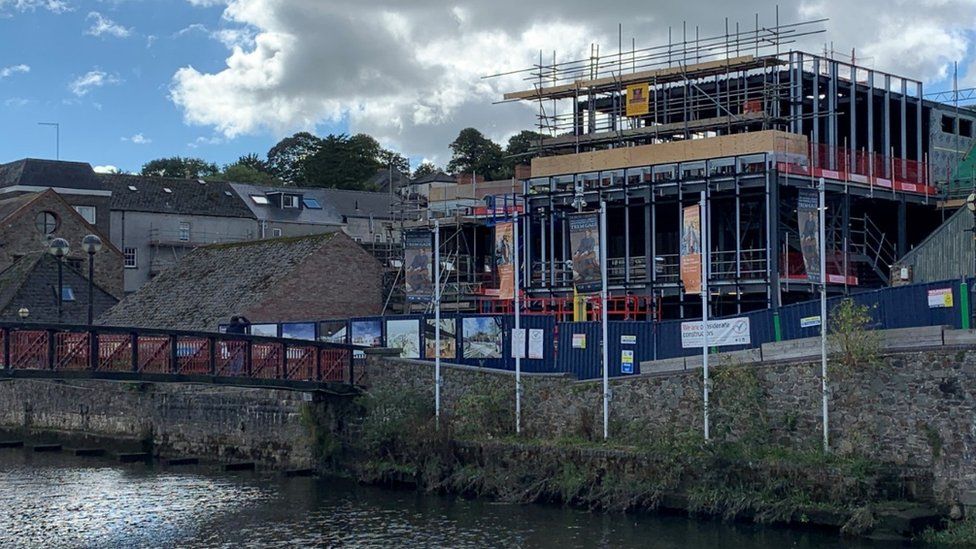 Scaffolding erected on site of Ocky White store