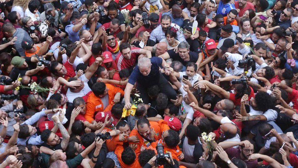 Brazilian ex-president Luiz Inacio Lula da Silva is lifted by supporters after attending a Catholic Mass in memory of his late wife Marisa Leticia, at the metalworkers' union building in Sao Bernardo do Campo, in metropolitan Sao Paulo, Brazil, 7 April 2018