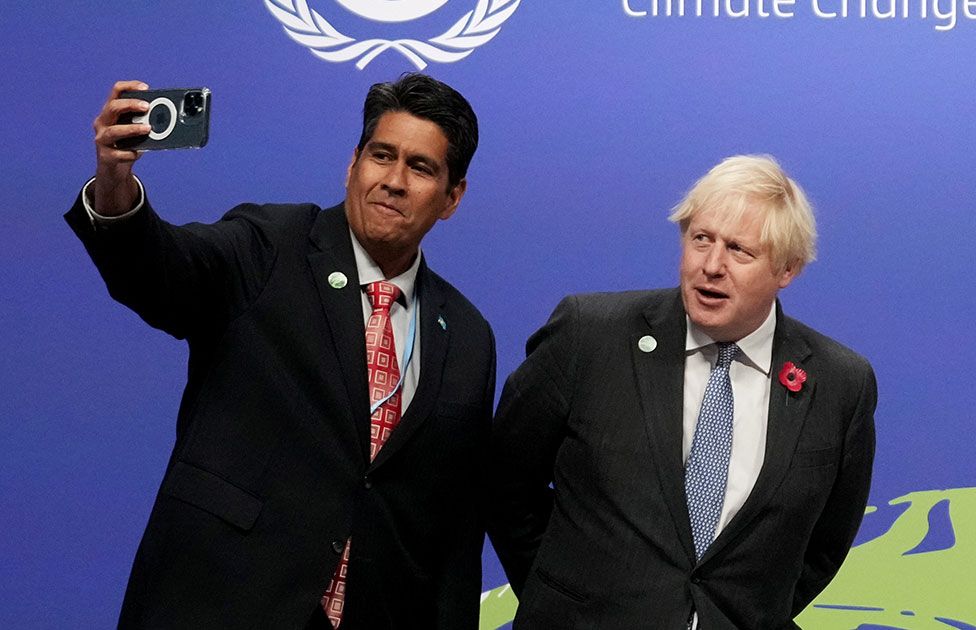 Prime Minister Boris Johnson (left) and Palau President Surangel Whipps at the UN Climate Change Conference (COP26) in Glasgow, Scotland, on 1 November 2021