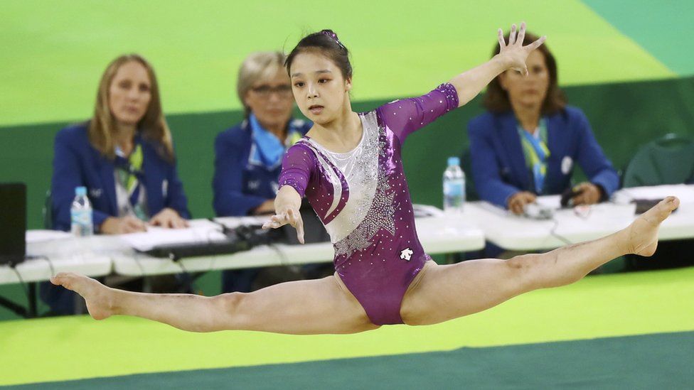 Lee Eun Ju (KOR) of South Korea competes on the floor during the women"s qualifications.