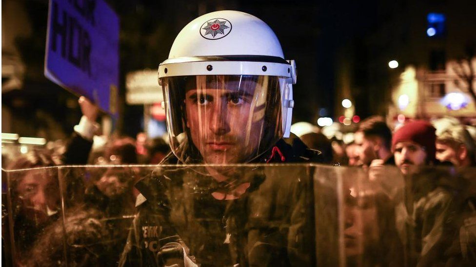 Turkish riot police block a street during a rally marking the International Women's Day in Istanbul, Turkey, 08 March 2023