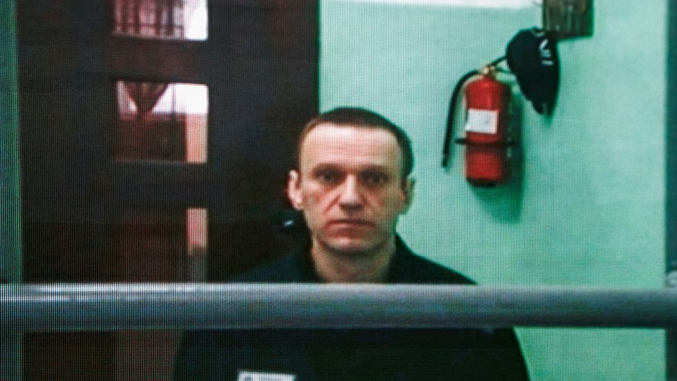 Jailed Russian opposition figure Alexei Navalny appears on a screen via a video link from his penal colony during court hearings in Moscow, 22 June 2023