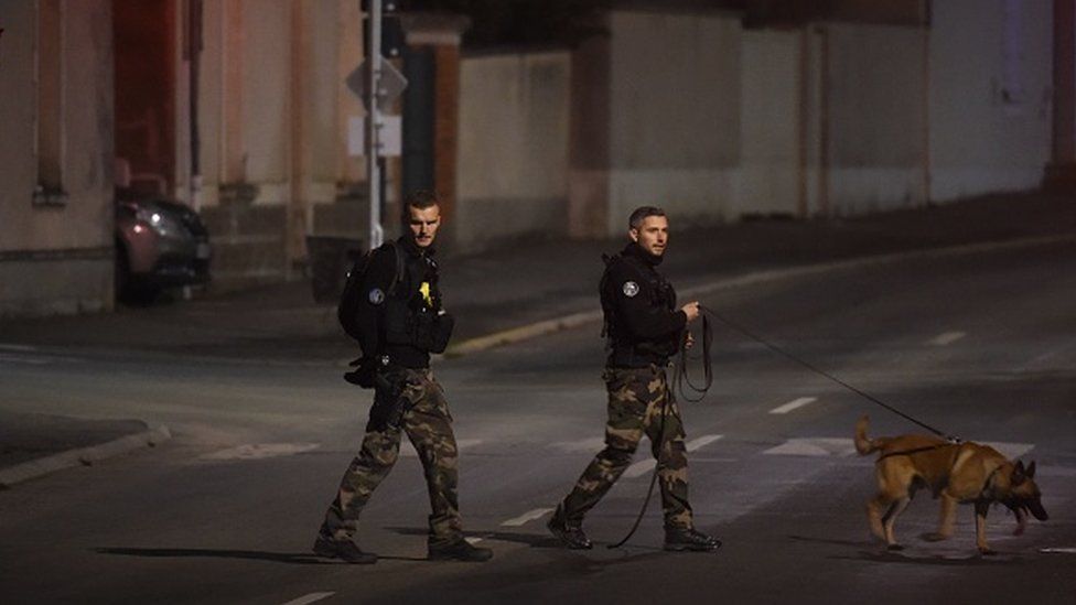 French police officers with dogs