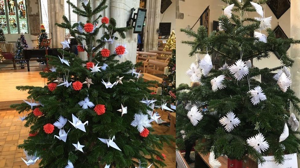 Two Christmas trees with origami decorations