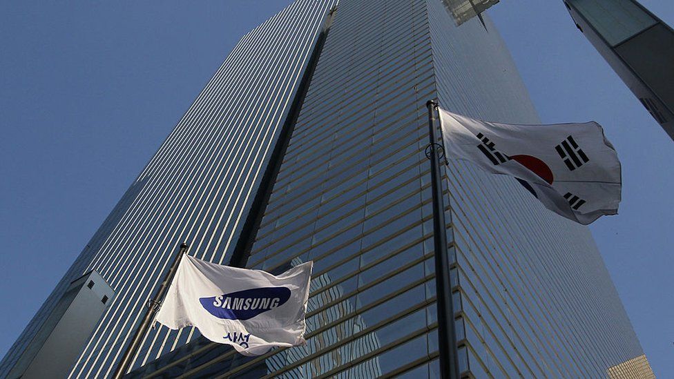 A Samsung flag flies outside the company's headquarters