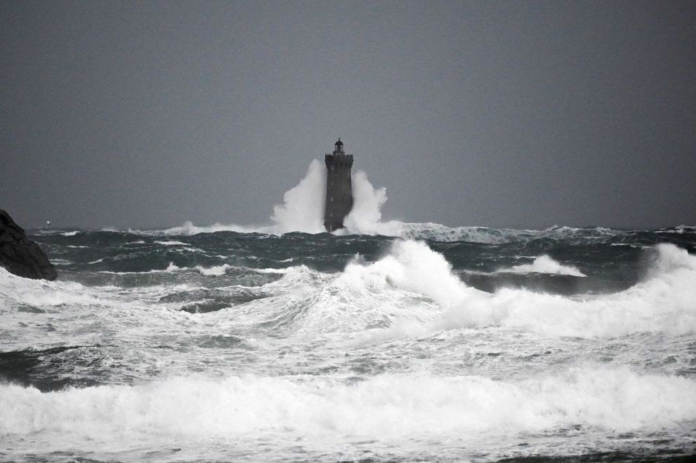Waves crashing on the "Phare du Four" (Four's lighthouse) in Porspoder, western France, on November 2, 202