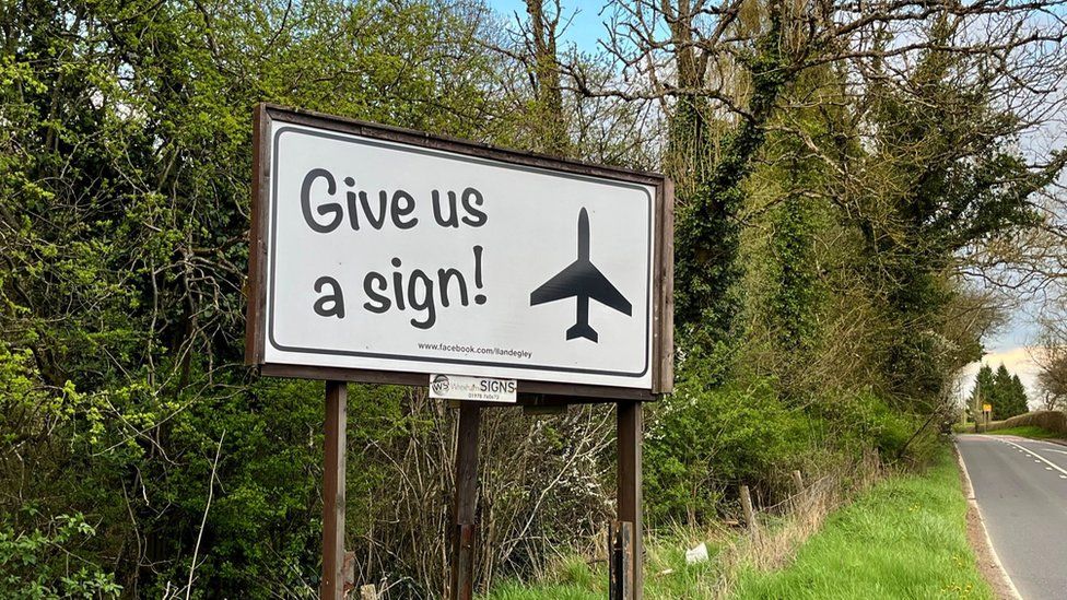 'Give us a sign' sign