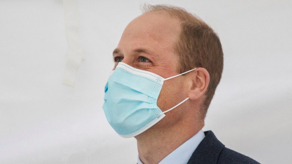 Prince William wearing a mask