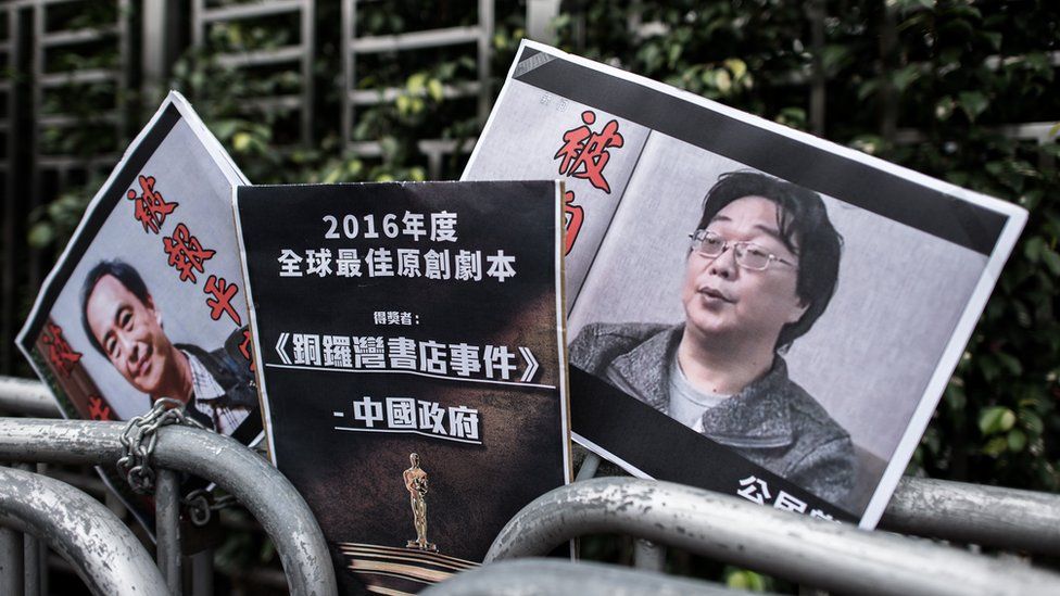 Placards showing missing bookseller Lee Bo and his associate Gui Minhai