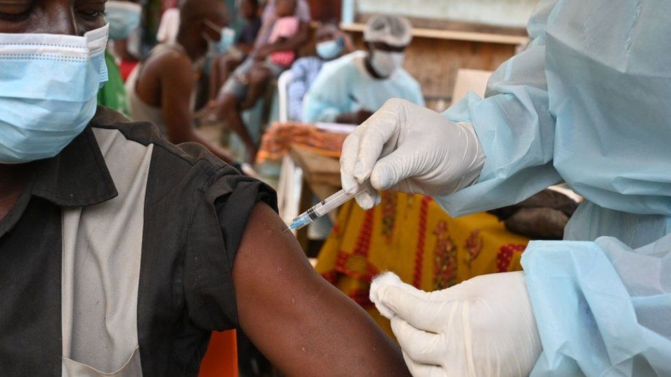Someone being vaccinated against Ebola in Ivory Coast