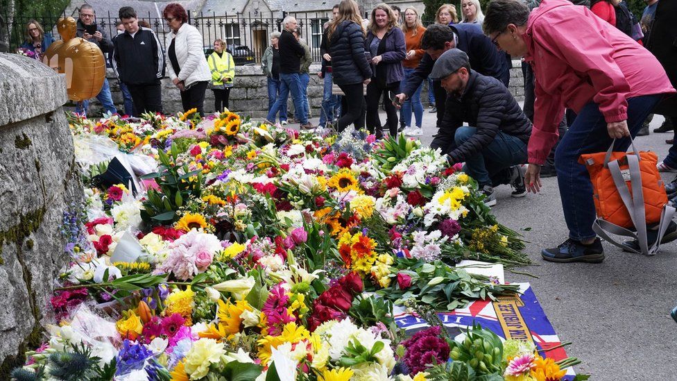 Well wishers leave floral tributes at Balmoral Castle