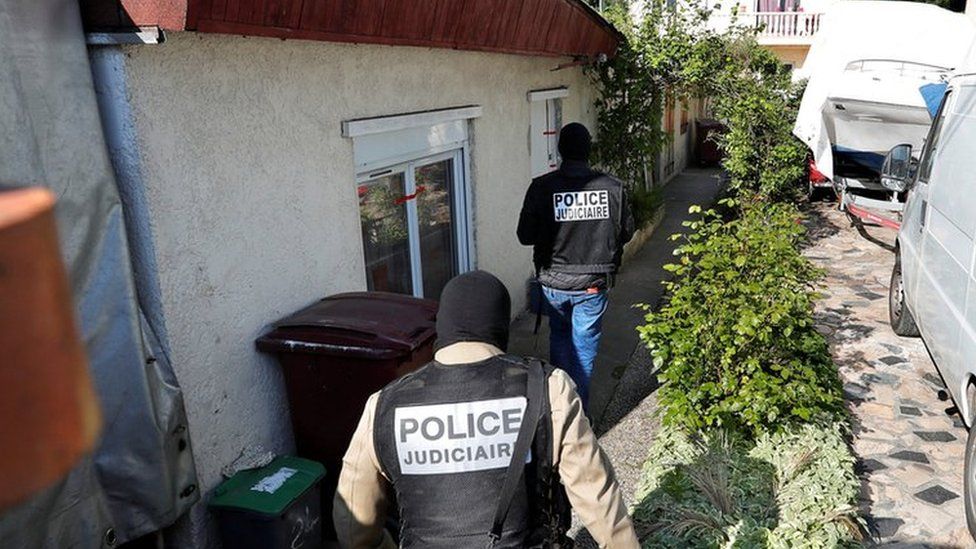 Police at house of suspected gunman in Paris suburb of Chelles