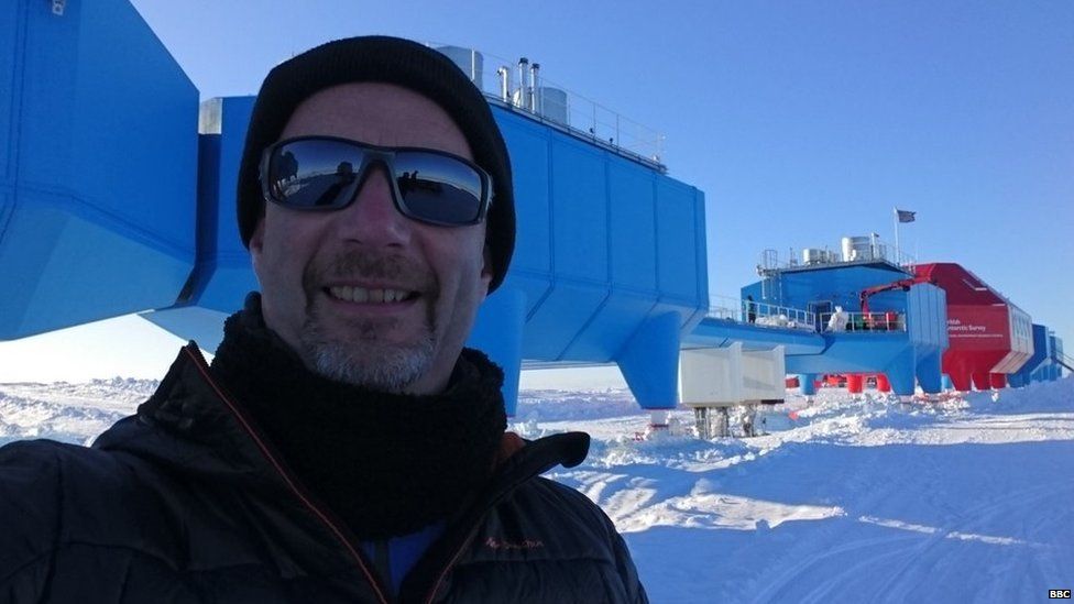 Peter Gibbs in foreground in front of Halley. Made up of several blue pods.