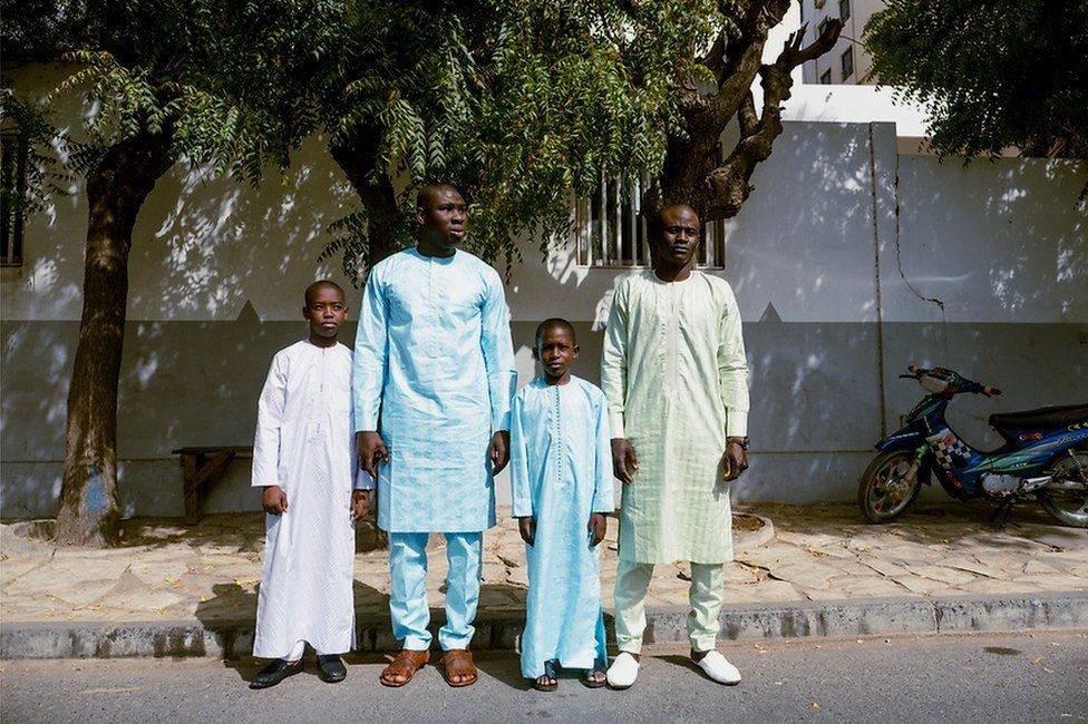 Cheirno Mohamad Sanogo, Adama Traoré, Papa and Yoro stand in a line