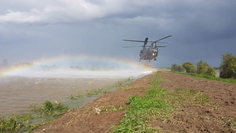 Helicopter dropping ballast