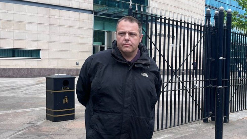 Neil Beckett outside court