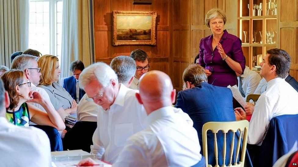 Theresa May addressing ministers at Chequers