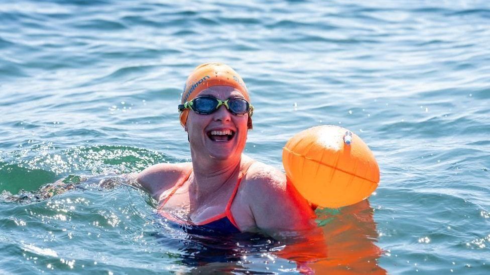 Gill in the sea with a float