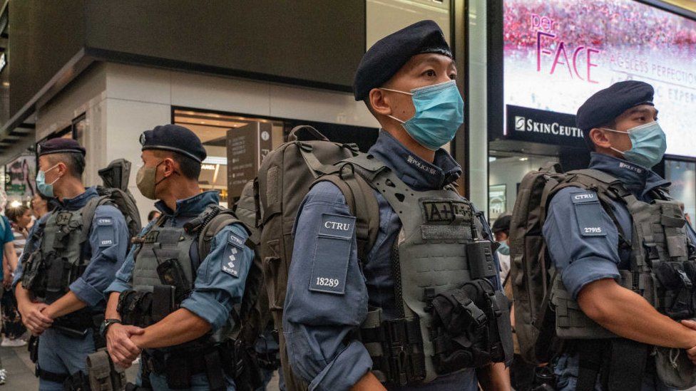 Counter Terrorism Response Unit stand guard at Causeway Bay near Victoria Park on June 04, 2023 in Hong Kong, China