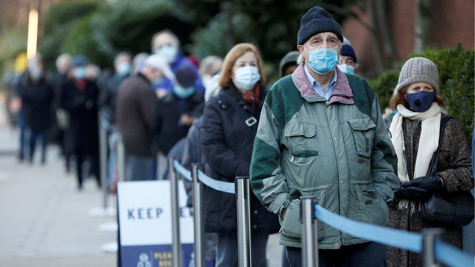 A man queues for a Covid vaccine