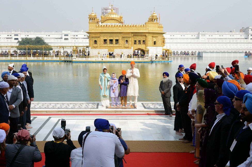 Mr Trudeau and his family at the Golden Temple in Punjab