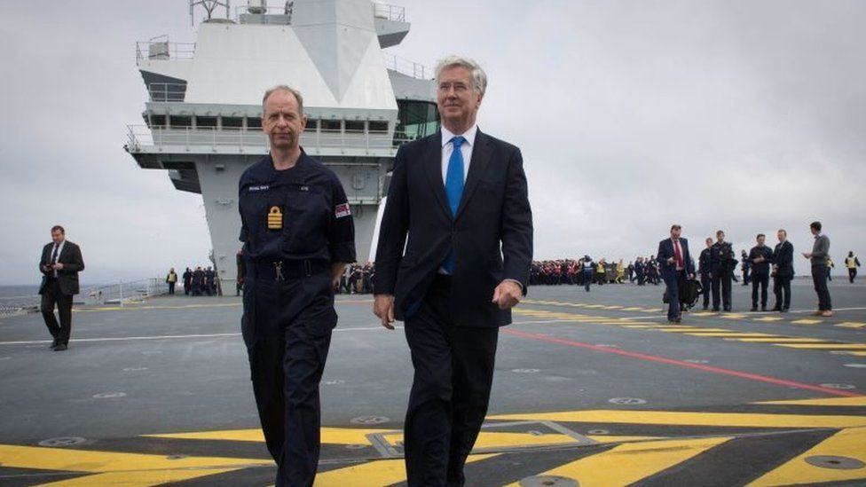 Defence Secretary Michael Fallon with Commanding Officer Captain Jerry Kyd