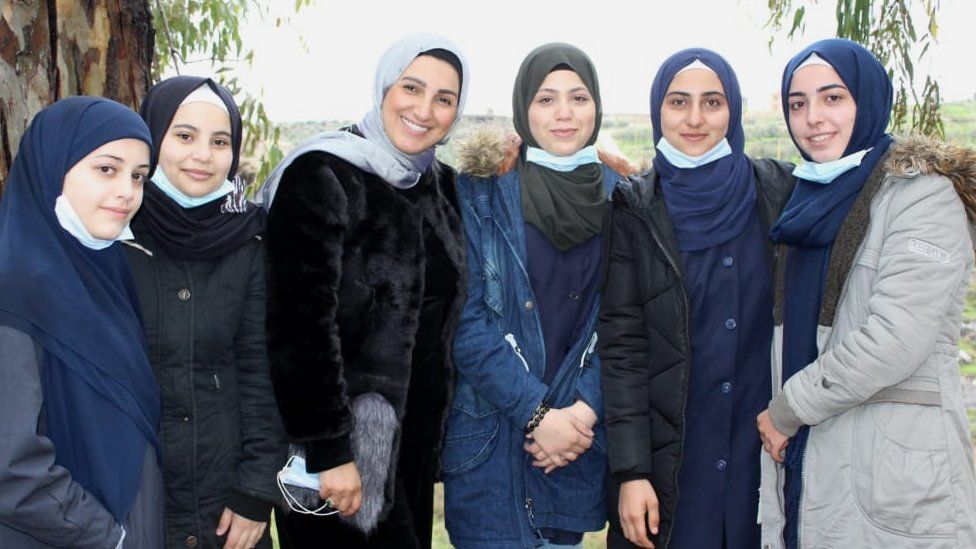 Hawraa with pupils at the school for Syrian refugees where she works