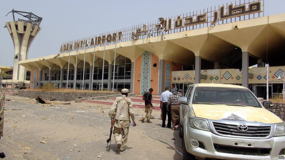 Yemeni pro-government fighters outside Aden's international airport on 14 July 2015