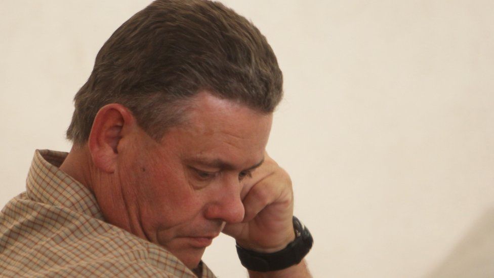 Theo Bronkhorst a professional hunter appears at the magistrates court on the first day of trial in Hwange about 700km south-west of Harare, Zimbabwe, Monday 28 September 2015