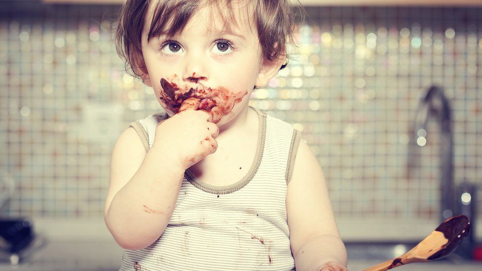 Baby deals eating chocolate