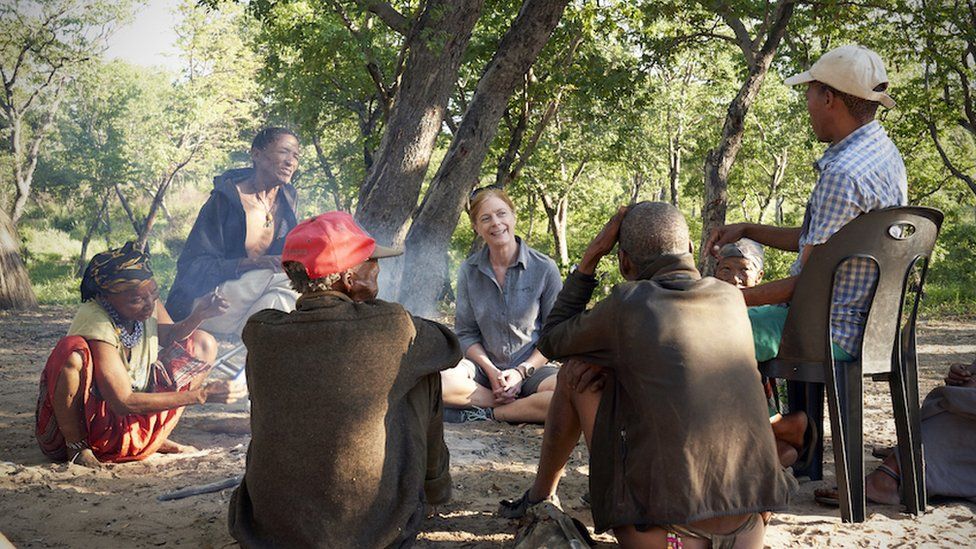 Prof Vanessa Hayes learning how to make fire with Jul'hoansi hunters in the now dried homeland of the greater Kalahari of Namibia