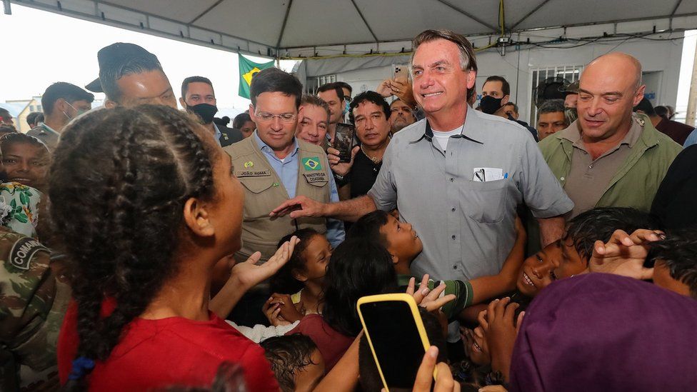 A handout photo made available by Agencia Brazil shows president of Brazil, Jair Bolsonaro, during his visit to the border with Venezuela in Boa Vista, Brazil 26 October 2021.