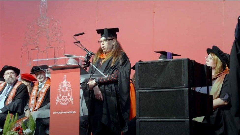 Aimee speaking at her graduation