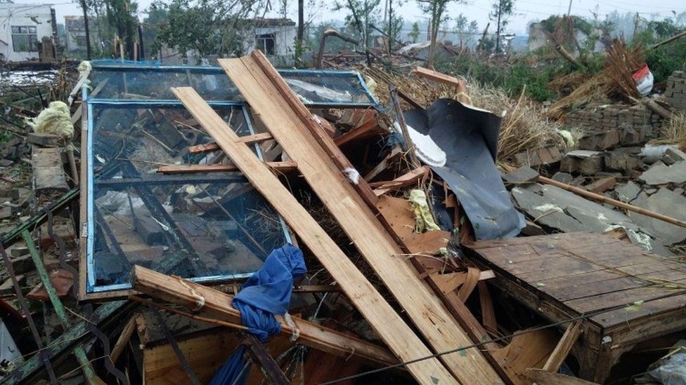 Damaged houses are seen after a tornado hit Funing county, Yancheng, Jiangsu province, China June 23, 2016