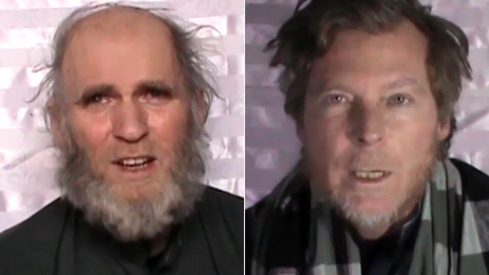 Images made from video released by the Taliban on 11 January 2017 show an American man identified as Kevin King (l) and an Australian identified as Timothy Weekes speaking on camera while in captivity.