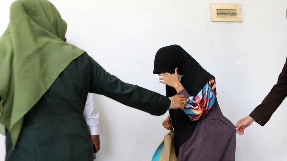 A woman in Aceh, Indonesia, before being caned in November for having sex outside of marriage. Aceh province already has strict laws against sex outside marriage