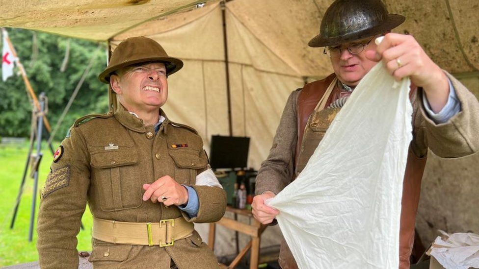 A re-enactment of a wounded soldier during an event at Kentwell Hall, Suffolk