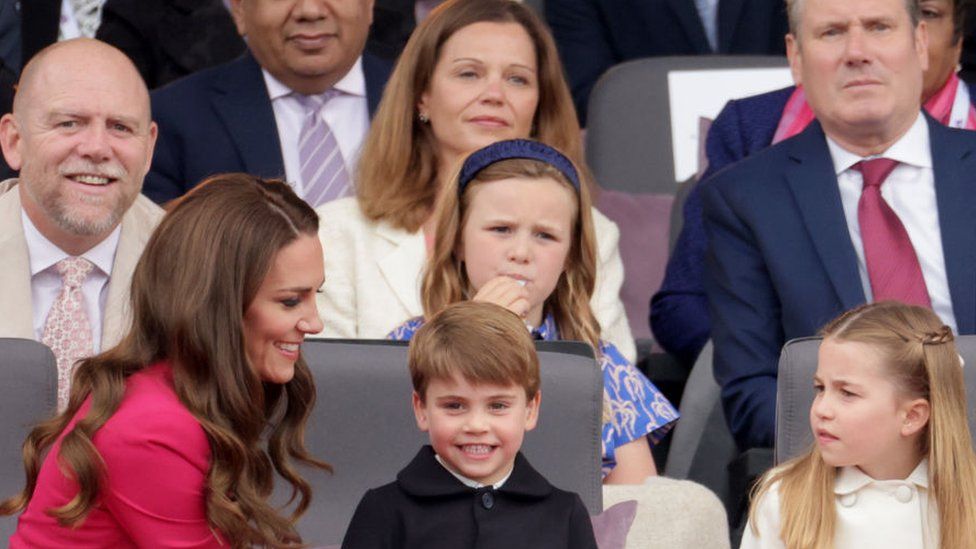 Catherine, Duchess of Cambridge, Prince Louis of Cambridge, Princess Charlotte of Cambridge wait ahead of the Platinum Pageant