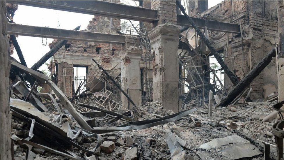 This photograph shows a view of a school destroyed as a result of fight not far from the centre of Ukrainian city of Kharkiv, located some 50 km from Ukrainian-Russian border, on February 28, 2022