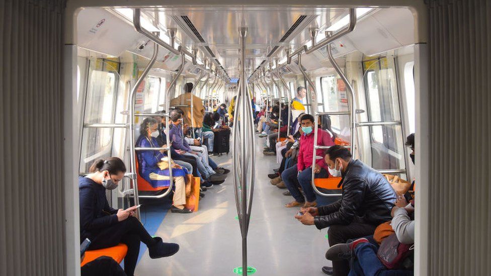  Commuters travel in a special driverless train on the Delhi Metro Pink Line after the virtual flagging off ceremony, on November 25, 2021 in New Delhi, India. The Pink Line became the second Delhi Metro line to have driverless operations after the Magenta Line.